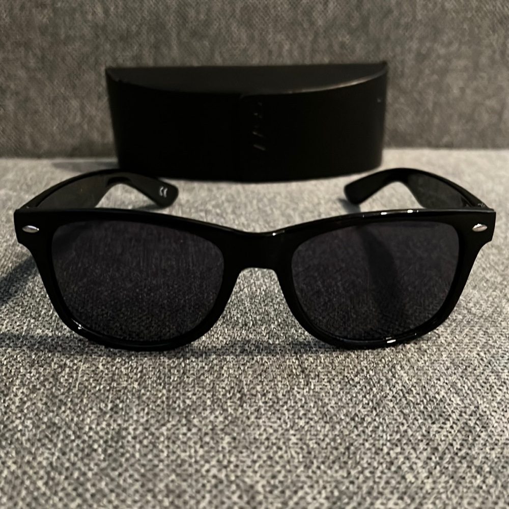 Oliver Peoples Shiny Black Sun Horn Like Sunglasses